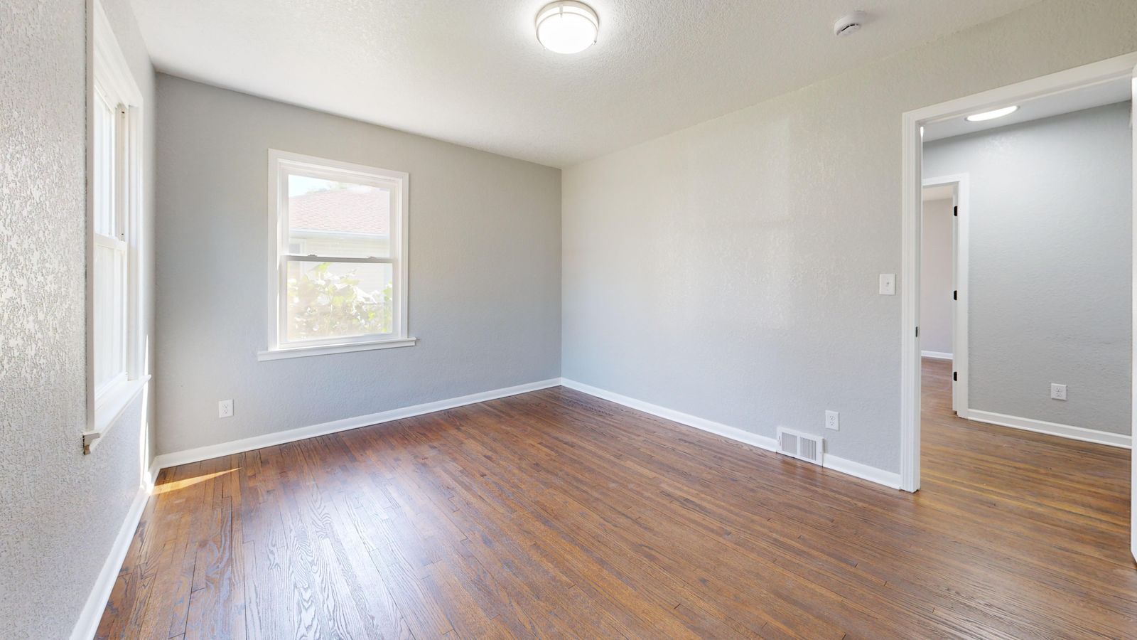 A garage turned into a real room, before