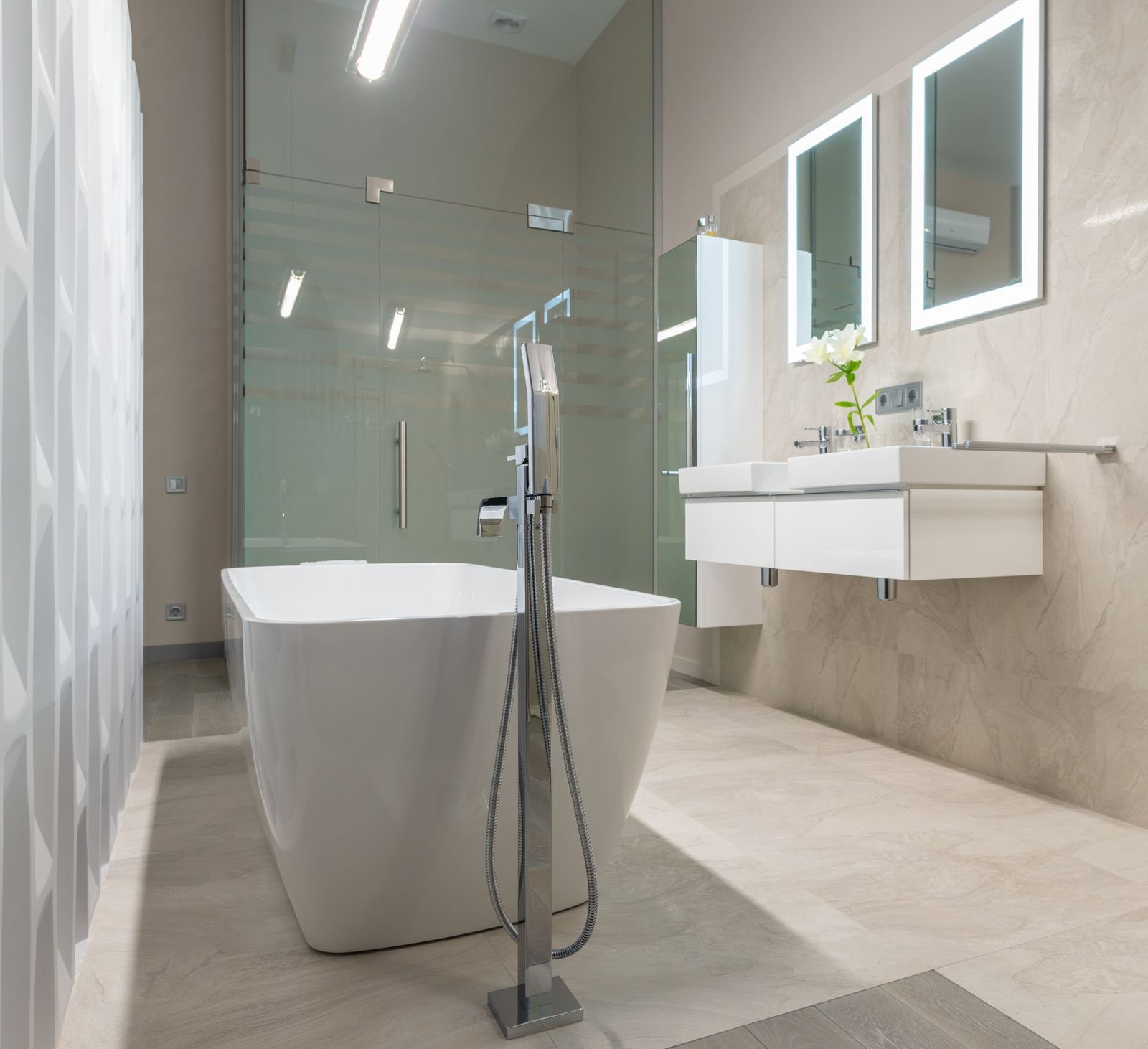 A bathroom under construction with solid backing installed behind the wall board
